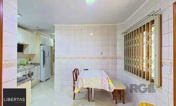 Imagem 5: Casa em Porto Alegre, no bairro Tristeza, com 3 dormitório(s), e 3 banheiros, à