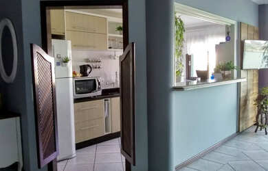 Imagem 6: Apartamento de três dormitórios de frente para lagoa do violão em Torres