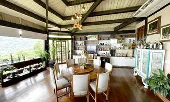 Imagem 8: Charmosa casa assinada por Zanina Caldas com encantadora vista panorâmica!