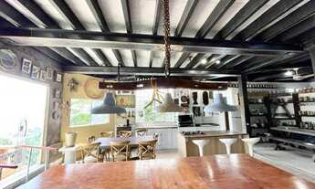 Imagem 6: Charmosa casa assinada por Zanina Caldas com encantadora vista panorâmica!