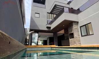 Imagem 6: Casa de luxo all black com piscina e vista para o parque da Pedra Branca