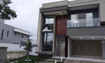 Imagem 2: Casa de condomínio para venda tem 251 metros quadrados com 4 quartos