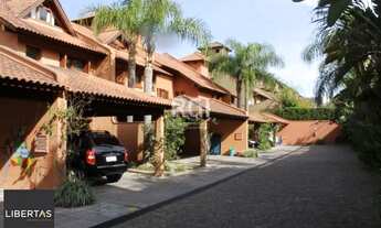 Imagem 3: Casa em Condomínio 4 dormitórios para alugar Três Figueiras Porto Alegre/RS