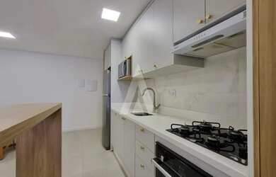 Imagem 8: Apartamento semimobiliado com 2 quartos, sendo 1 suíte, sacada com churrasqueira e elevado