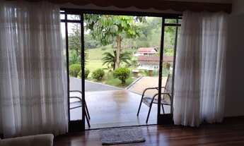 Imagem 6: Casa e terreno com lindo jardim