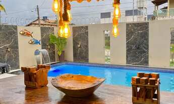 Imagem 5: Casa de praia com piscina