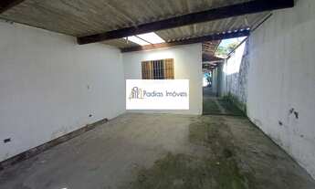 Imagem 3: Casa térrea com 2 dormitórios, 2 vagas de garagem, wc social e 1 wc externo. Com churrasqu