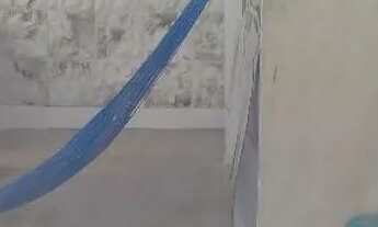 Imagem 7: Casa com piscina e garagem coberta