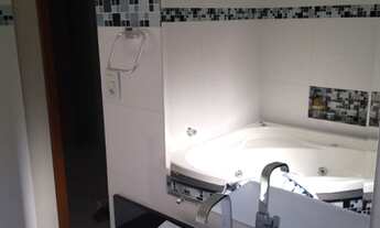 Imagem 7: Casa de condomínio para venda possui 210 metros quadrados com 3 quartos