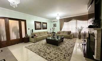 Imagem 6: Conforto e espaço! Casa de 6 dormitórios com espaço gourmet e piscina, localizad