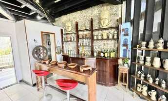 Imagem 10: Charmosa casa assinada por Zanina Caldas com encantadora vista panorâmica!