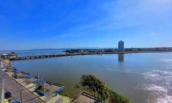 Imagem 3: Na beira do rio em Tramandaí, apartamento com quatro quartos, mobiliado, com uma linda vi