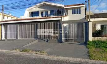 Imagem 2: Casa com 7 Dormitórios, 2 Suítes, 380 m², à venda por R$ 1.490.000 - Xaxim, Curitiba (PR