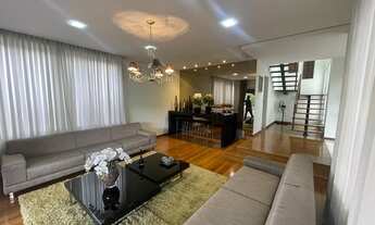 Imagem 7: Casa de condomínio para venda possui 820 metros quadrados com 5 quartos