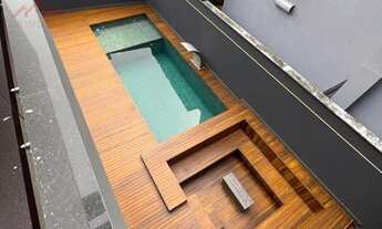 Imagem 6: Casa de luxo all black com piscina e vista para o parque da Pedra Branca