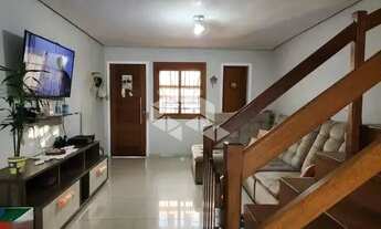 Imagem 6: Casa com 3 dormitórios no bairro Guarujá em Porto Alegre