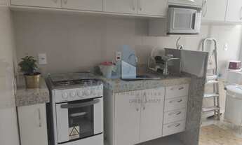 Imagem 7: Sala em espaço compartilhado com cozinha e sala de reunião