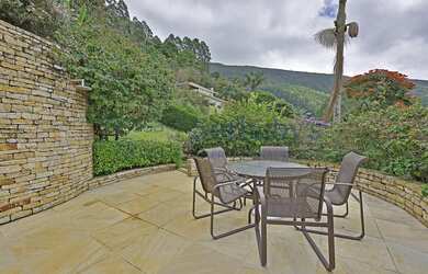 Imagem 5: Casa esapetacular em condomínio fechado com piscina de borda infinita