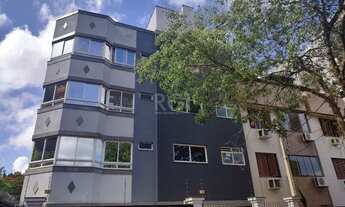 Imagem 2: Apartamento com 3 dormitórios, 1 suíte, sala ampla com churrasqueira, box 2 vaga coberta