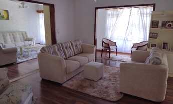 Imagem 3: Casa e terreno com lindo jardim