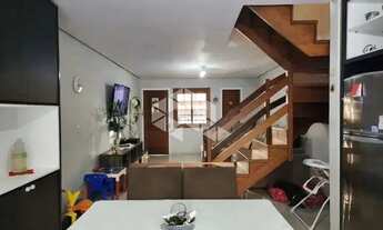 Imagem 2: Casa com 3 dormitórios no bairro Guarujá em Porto Alegre