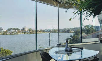 Imagem 3: Apartamento de três dormitórios de frente para lagoa do violão em Torres