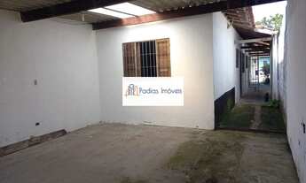 Imagem 4: Casa térrea com 2 dormitórios, 2 vagas de garagem, wc social e 1 wc externo. Com churrasqu