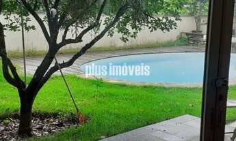 Imagem: Casa de alto padrão com 6 suítes e 8 vagas