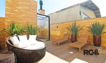 Imagem 3: Apartamento de três quartos com suíte e duas vagas de garagem no bairro Passo da Areia, em