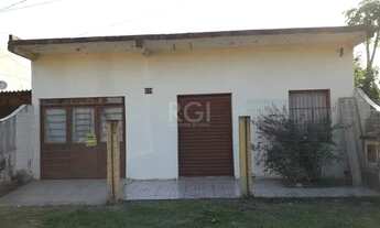 Imagem: Casa com sala comercial na frente Bairro