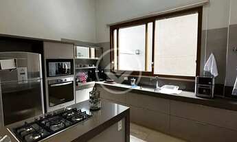 Imagem 4: Casa térrea com 3 suítes, closet, área gourmet com piscina no Condomínio do Lago. codigo