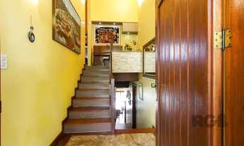 Imagem 3: Casa com 4 dormitórios, sendo 1 suíte, com 2 vagas cobertas, no bairro Nonoai, Porto Alegr