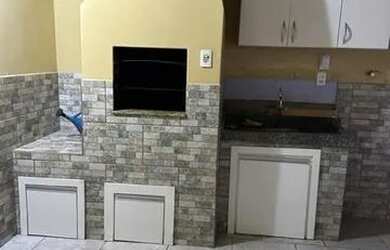 Imagem 7: Casa térrea mais antiga, semi mobiliada, com 03 dormitórios, sendo 02 suítes, 01 bwc socia