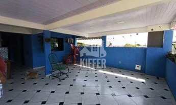 Imagem: Casa tríplex com 5 quartos e terraço à