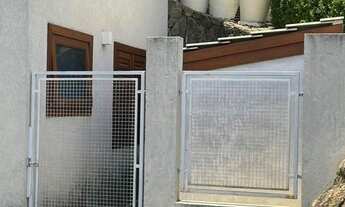 Imagem 7: Casa com 4 dormitórios sendo 2 suítes em condomínio fechado na Serra da Cantareira com seg