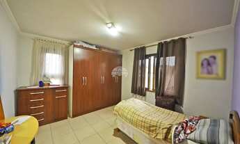 Imagem 2: Casa para venda com 263 metros quadrados com 3 quartos em Água Verde - Curitiba - PR