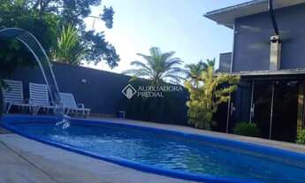 Imagem 2: Casa 3 dormitórios, sendo 3 suítes, banheira de Hidromassage, situada nos Ingleses do Rio