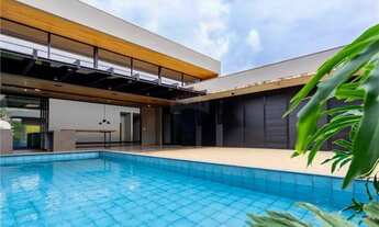 Imagem 3: Casa de condomínio para venda possui 540 metros quadrados com 4 quartos