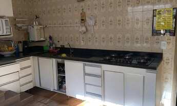 Imagem 3: Prédio com 2 apartamentos 3 quartos e uma loja. Gama Leste