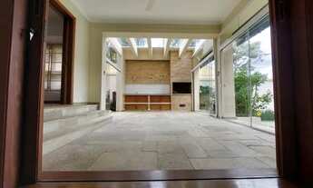 Imagem 2: Casa no condomínio, 4 suítes, piscina e churrasqueira!