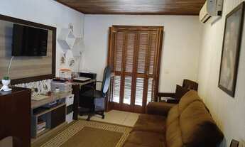 Imagem 2: Casa para venda possui 172 metros quadrados com 2 quartos em Campo Duna - Garopaba - SC