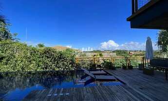 Imagem 2: Casa de Luxo à Venda em Arraial com 5 suítes: Desfrute de uma Vista Mar Privilegiada