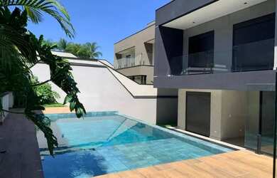 Imagem 2: Casa pronta no Condomínio Alphaville com 4 suítes