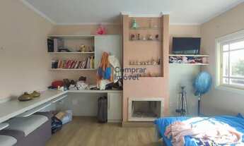 Imagem 4: Casa 4 dormitórios, 1 suíte, 3 vagas no bairro Mario Quintana