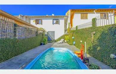 Imagem 3: Casa dois dormitorios com piscina