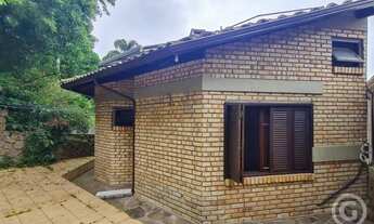 Imagem 6: Casa espaçosa e semimobiliada em Sambaqui, perfeita para famílias