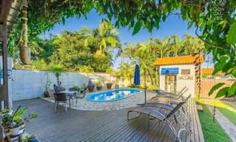 Imagem 4: Casa de praia com 03 Quartos, amplo terreno com piscina e churrasqueira, Guaratuba