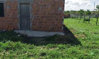 Imagem 2: Terreno com meia tarefa e uma casa em Glória