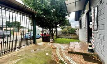 Imagem 3: UM TERRENO COM UMA CASA SIMPLES