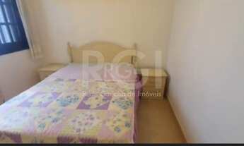 Imagem 7: Casa com dois andares no bairro São João em Porto Alegre/RS, possuindo ambientes bem dispo